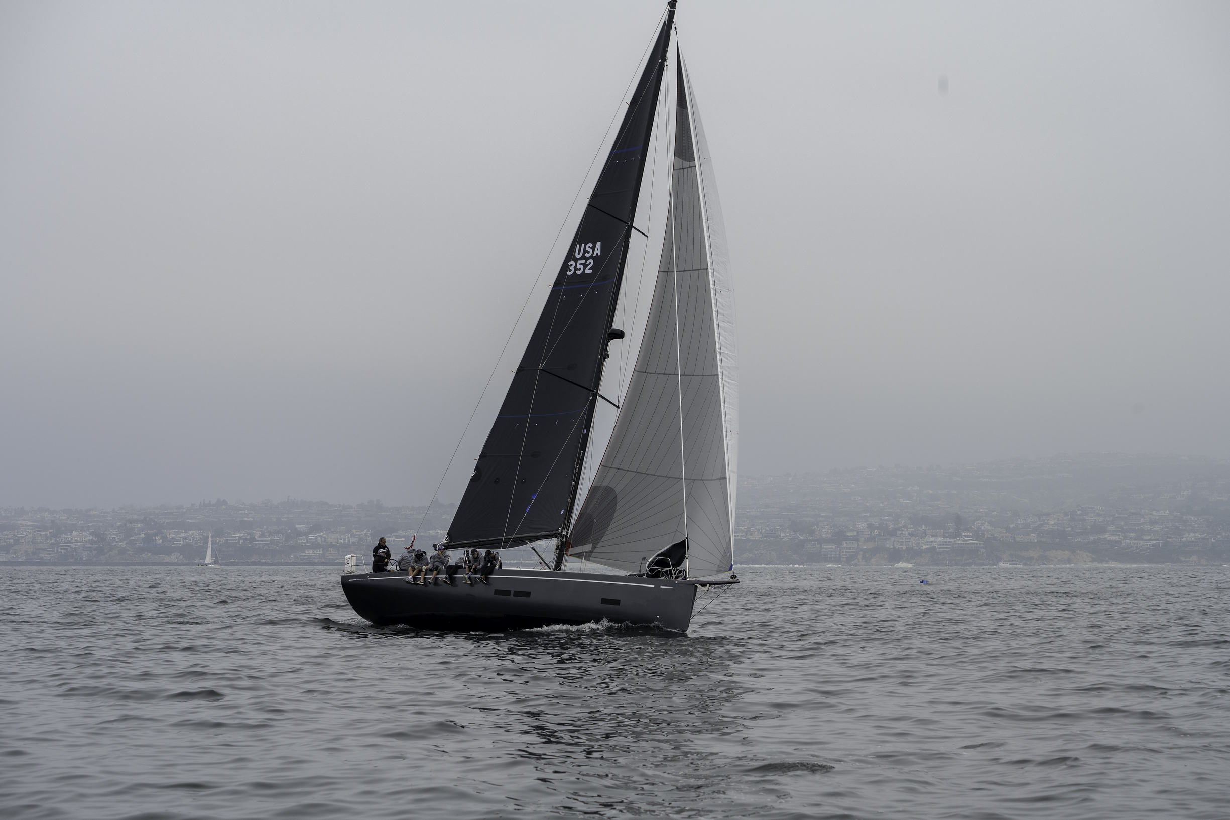 Blackwing sailing the Dana Point coastline