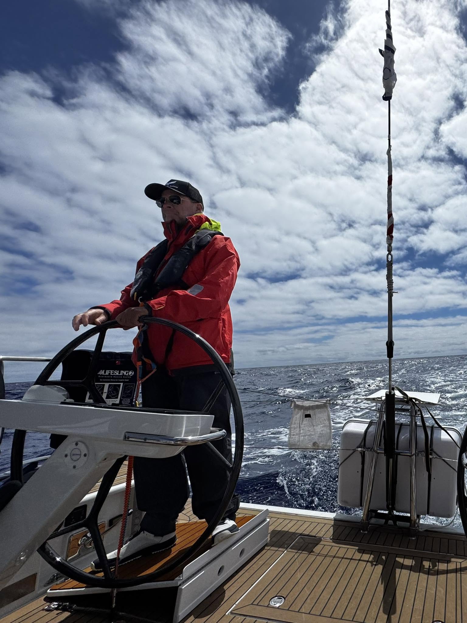 At the helm of Blackwing on the open ocean